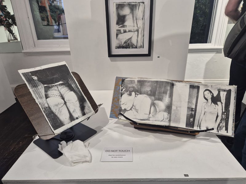 Artist book and prints on plinth